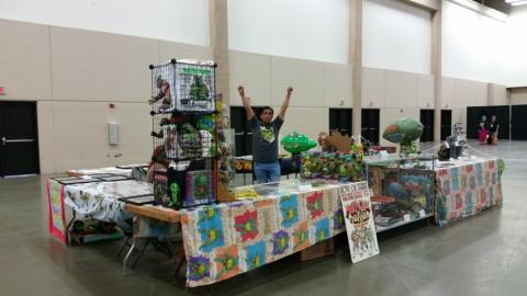 Fugitoid at the final set up of the Cowabunga Corner booth for Fandom Fest 2015