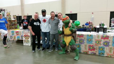 Robbie Rist, Partners in Kryme, Kenn Scott and Nick Palma visiting the Cowabunga Corner Booth.  Leatherhead working the booth.
